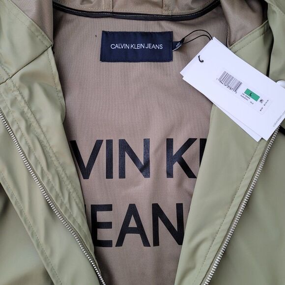 Calvin Klein Jeans Solid Monogram Logo Patch Hooded Rain Jacket - Picture 7 of 10